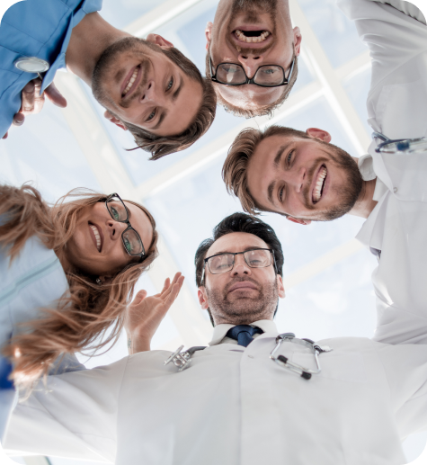 Young Doctors As Team Stack Hands Together Motivation 1